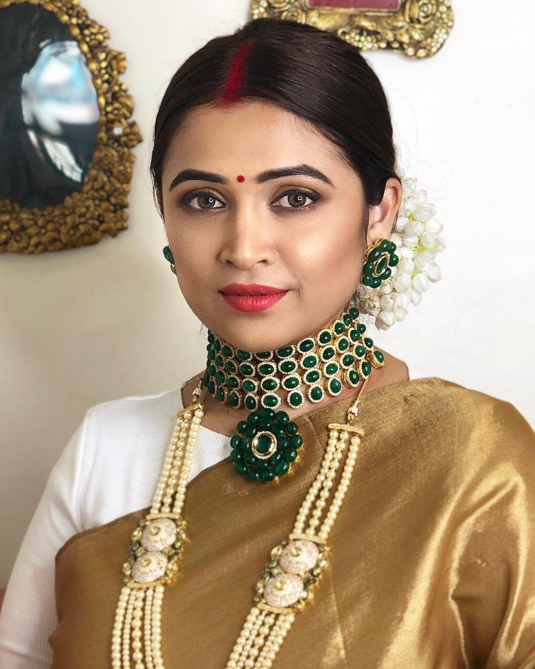 Tejaswini in a traditional bridal look