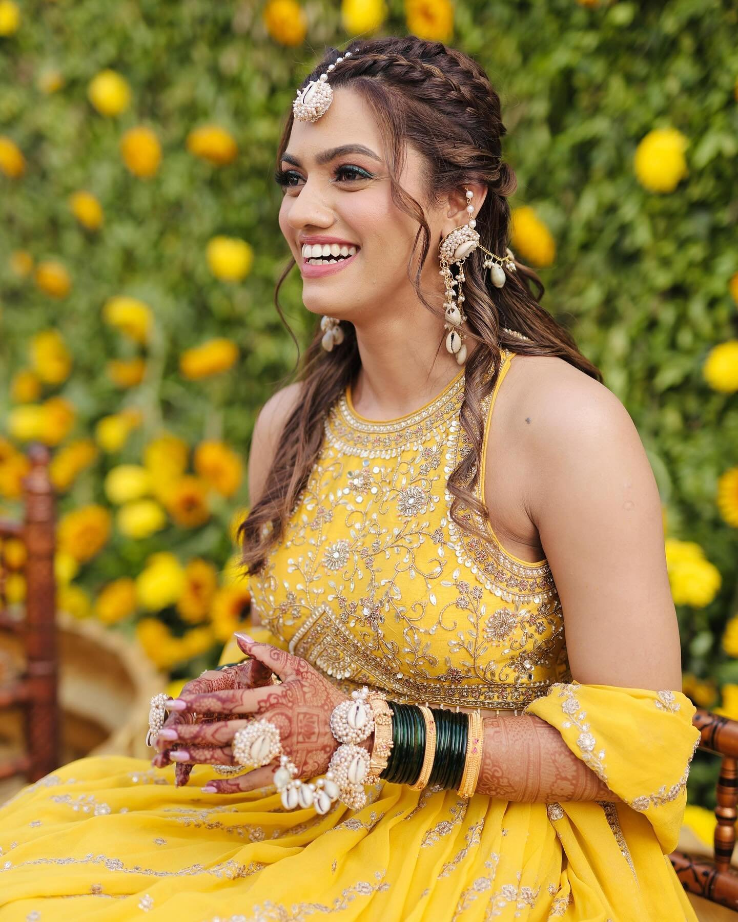 Maharashtrian bride haldi look in floral setting, Mumbai