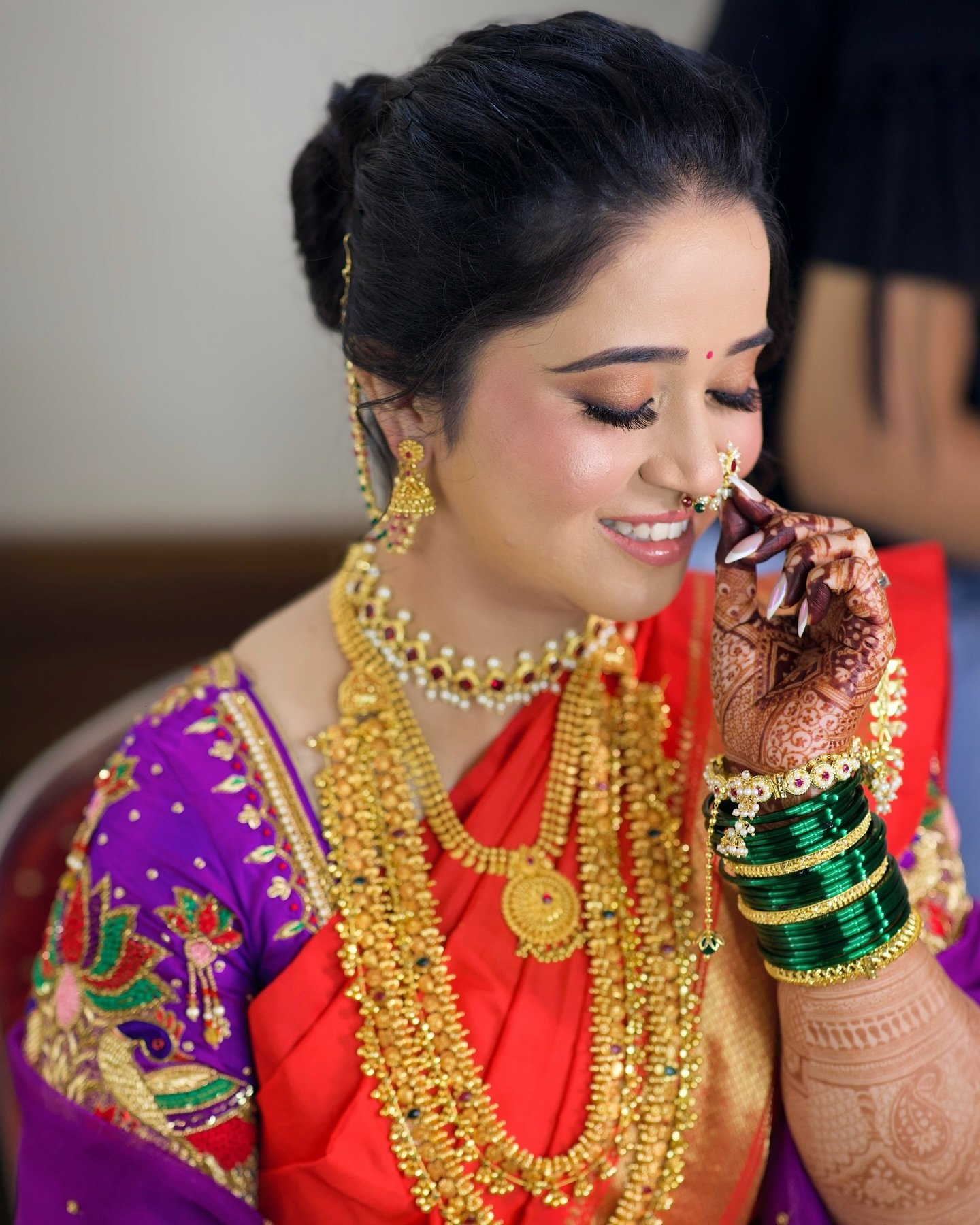 Maharashtrian bride in purple nine-yard Nauvari saree, Mumbai
