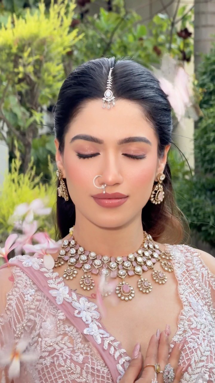 Marathi bride in a golden ceremony look with traditional jewellery