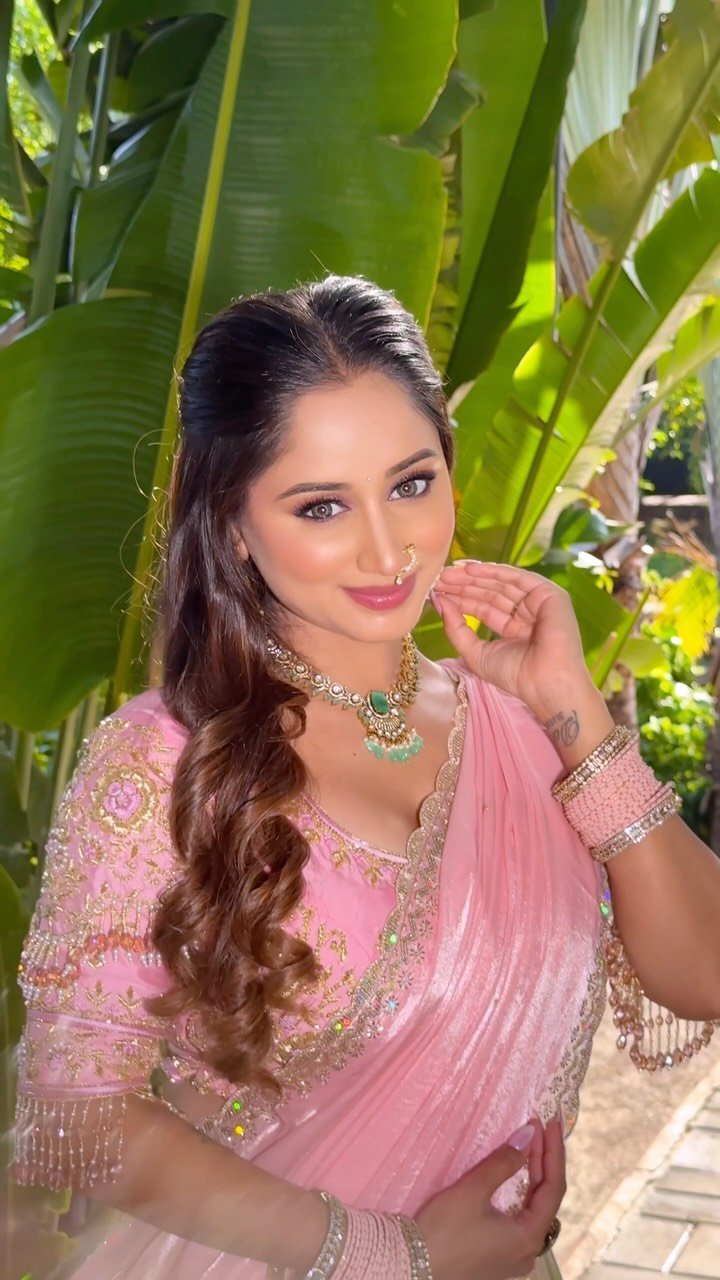 Still from a reel of three bridal looks by Tejaswini Gote