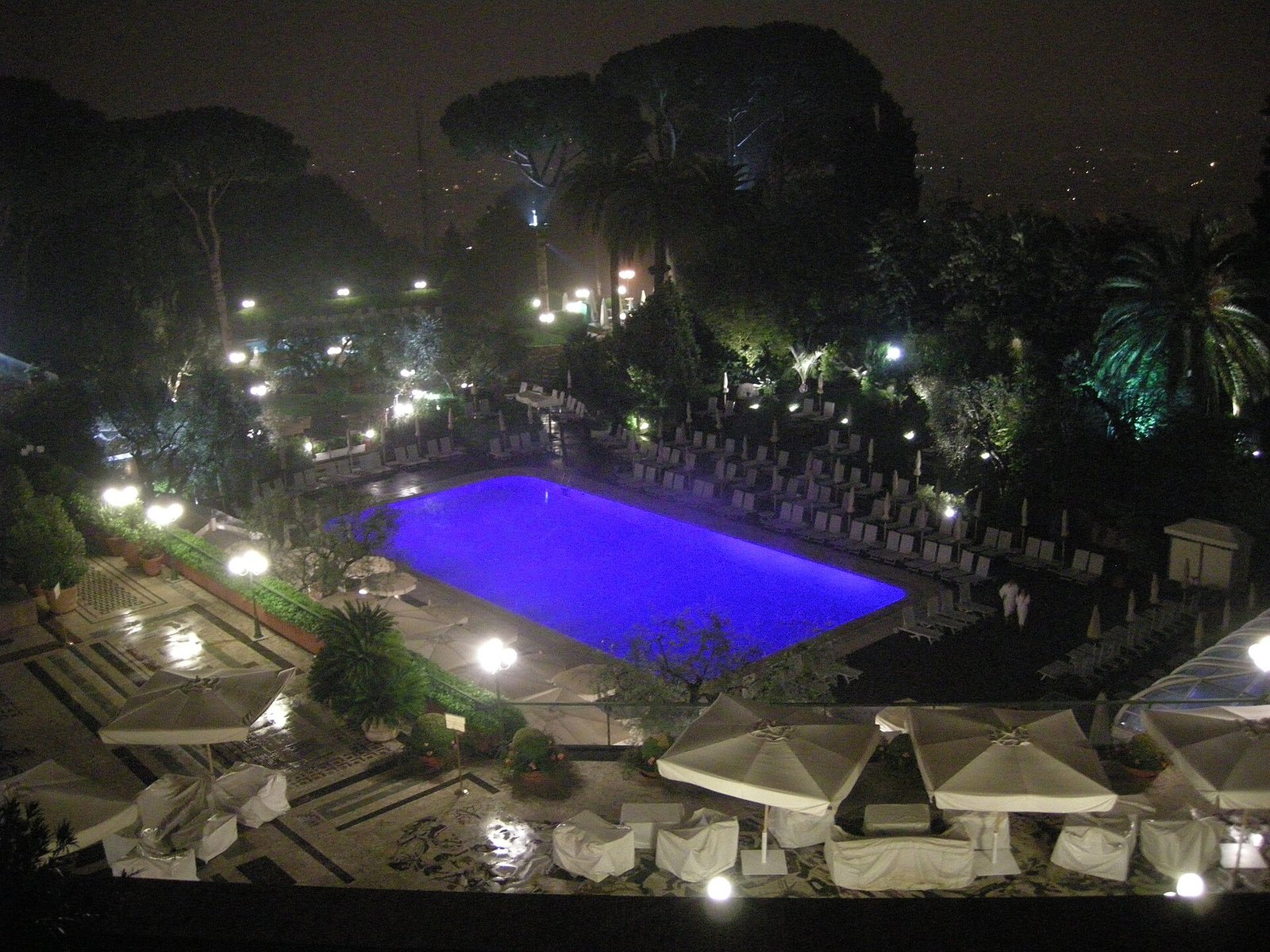 The outdoor pool at Rome Cavalieri on Monte Mario, at night